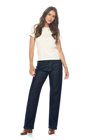 Model wearing the dark indigo womens travel jeans in relaxed style by aviator