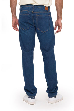 Men's vintage indigo travel jeans, straight fit, back view on model
