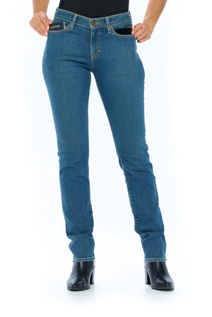 Model posing with vintage style travel jeans for women.