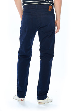 Back view of the men's travel jeans by aviator in navy blue