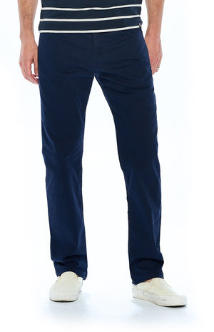 Front view of the men's travel pants by Aviator in navy blue