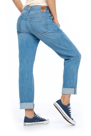 Back view of the Aviator relaxed boyfriend travel jeans in faded indigo