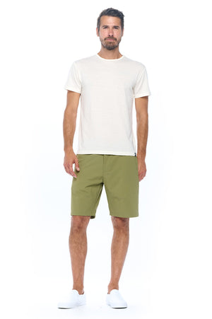 Aviator non stop travel shorts for men in olive green color.