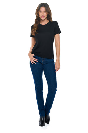 Full view of model wearing slim straight classic indigo women's travel pants