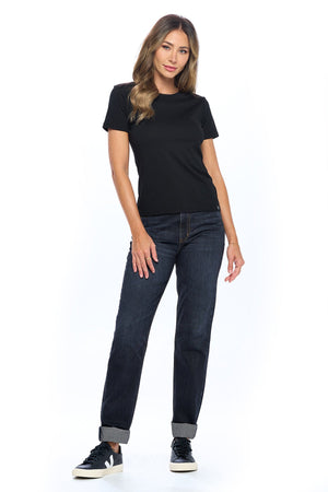 Full view of midnight indigo Aviator travel jeans for women