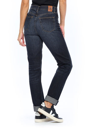 back view of the midnight indigo travel jeans