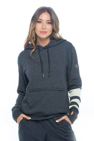 Model wearing the first class lounge travel hoodie for women.