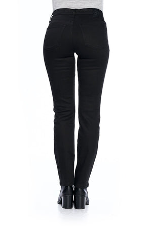 Back view of model wearing Aviator jet black straight travel jeans for women.