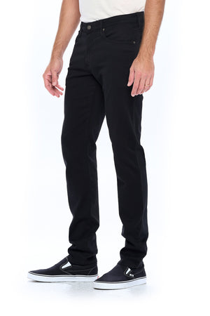 Side profile view of Aviator best travel jeans for men in jet black