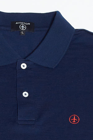 close up of merino wool polo shirt mens by aviator in navy blue