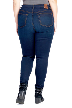 Back profile view of larger size dark indigo travel jeans