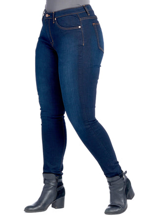 Larger side profile of skinny dark indigo travel pants