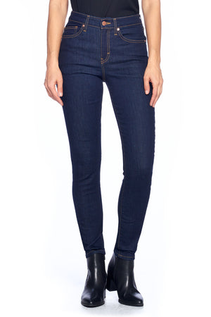Front view of Aviator dark indigo skinny travel jeans