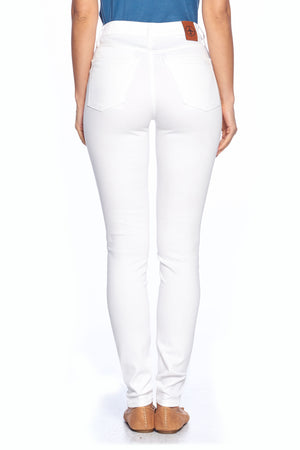 Back standing view of Aviator travel pants in skinny white style