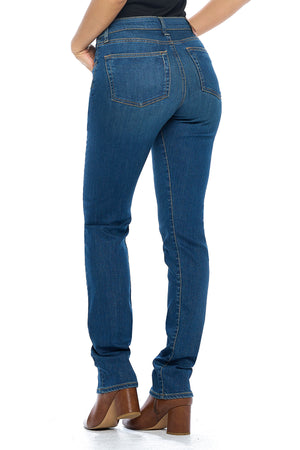 Back view of the slim straight travel jeans for women in vintage indigo by Aviator