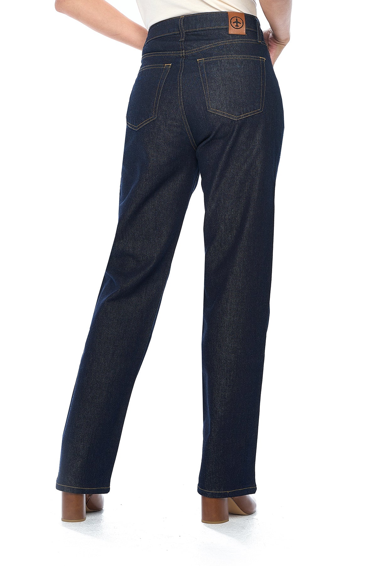 Back view of the relaxed dark indigo travel jeans for women