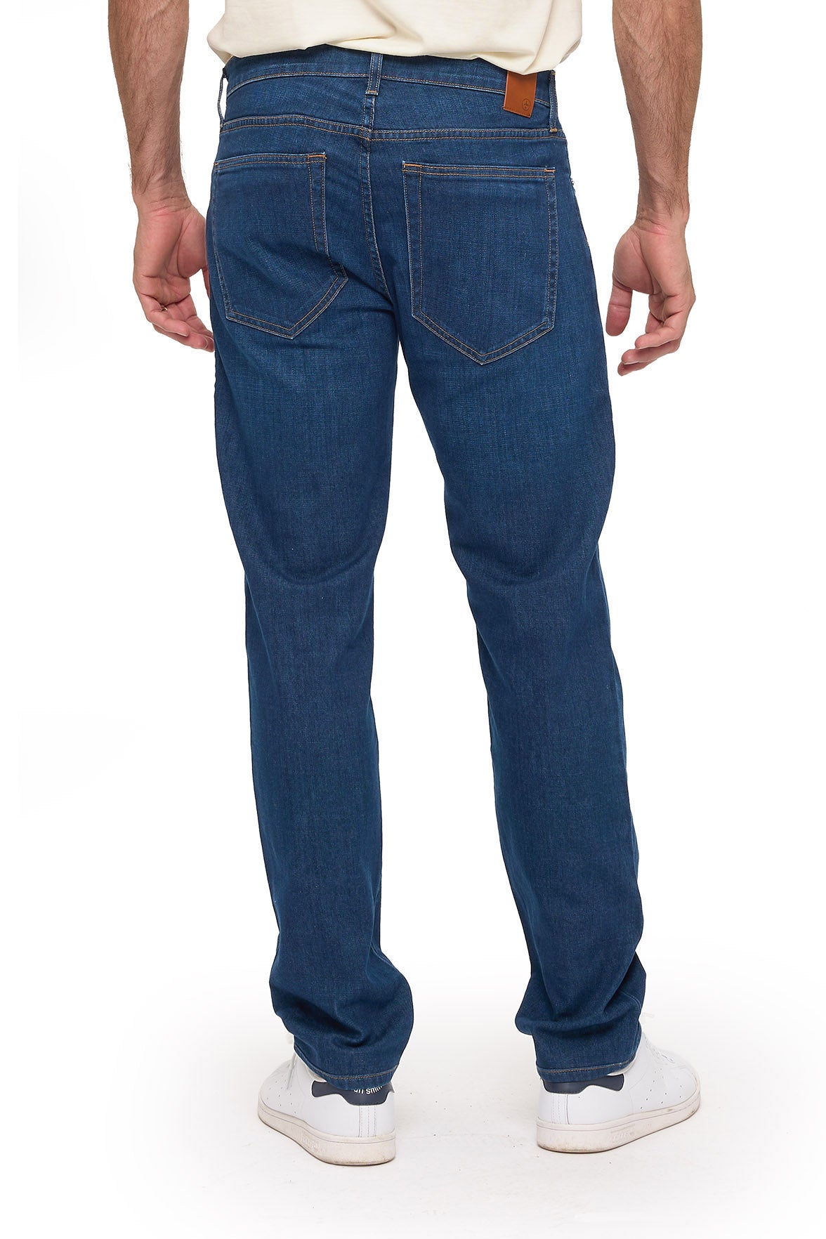 Men's vintage indigo travel jeans, straight fit, back view on model