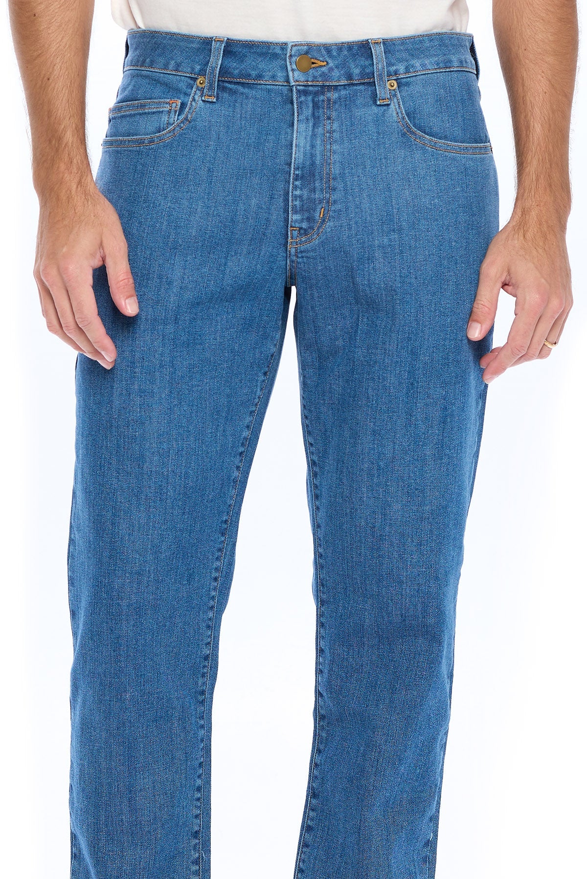 Model wearing the Aviator fly light 5 pocket travel jeans.