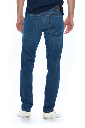 Back view of Aviator vintage indigo travel jeans for men