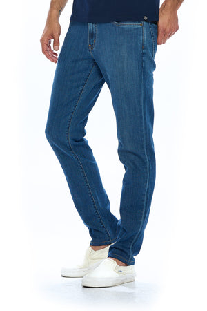 Side profile view of the Aviator vintage indigo travel jeans