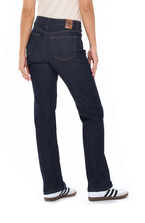 Back angle of the Aviator travel jeans in the relaxed concorde style with dark indigo color