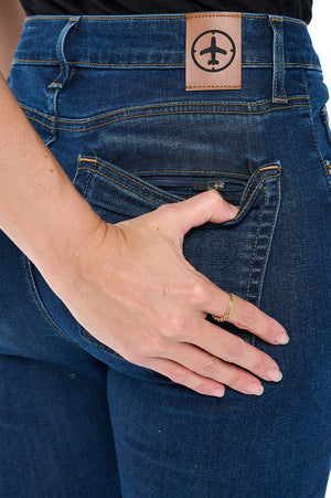 Hidden back zipper pocket with Aviator logo on the classic indigo pickpocket proof pants