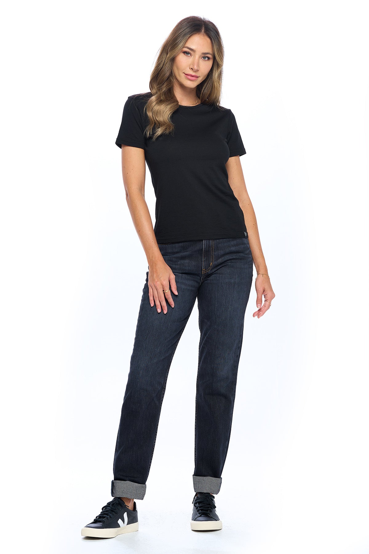 Full view of midnight indigo Aviator travel jeans for women